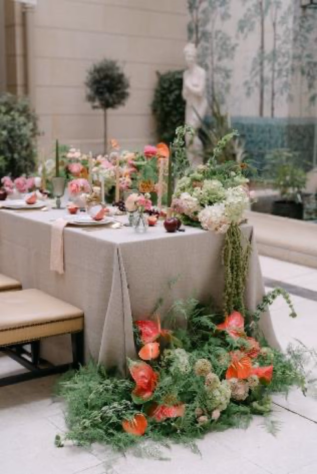 A long table dressed in the private patio for the Sunday lunch, fruit and flowers, Hôtel Castille, Paris