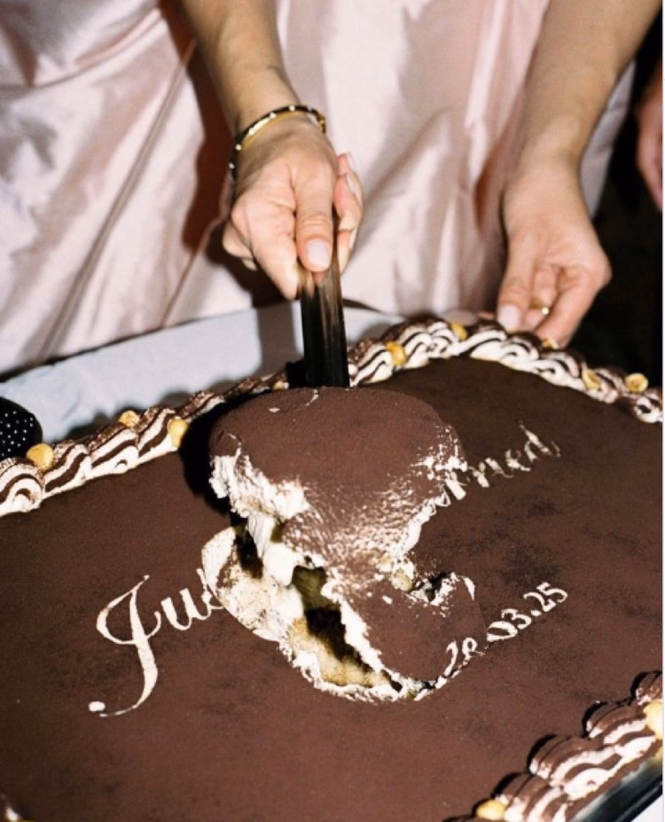 The couple serve the Castille's signature tiramisu dusted with cocoa, Paris